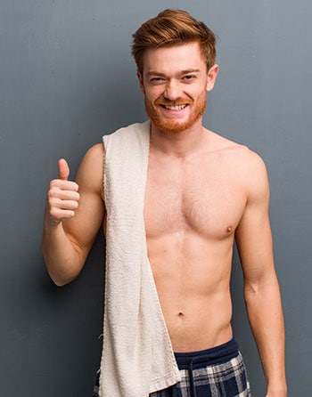 Smiling shirtless man